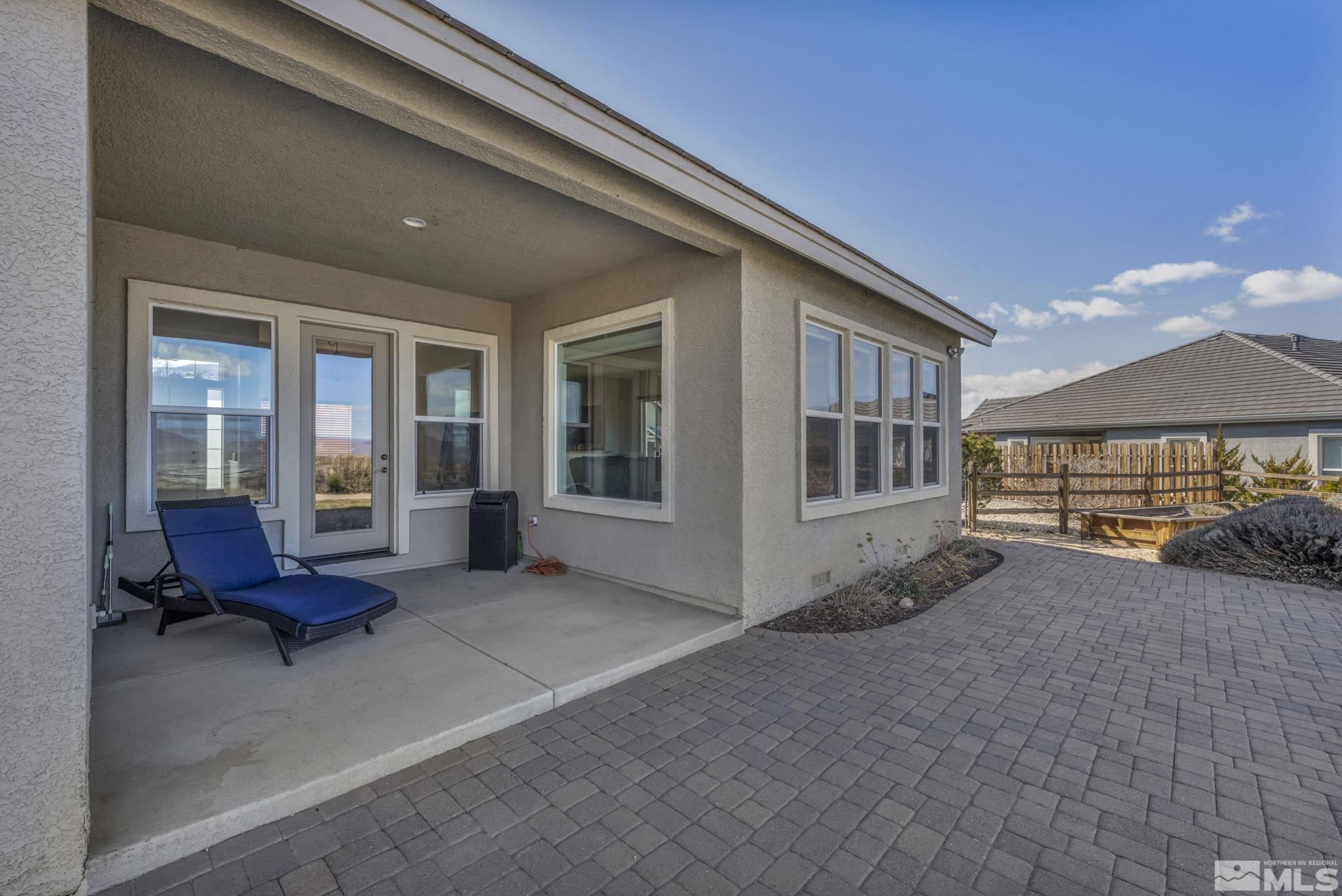 5544 New Mexico Court Reno, NV 89511 - Photo 27 of 39 a view of a house with backyard and sitting area