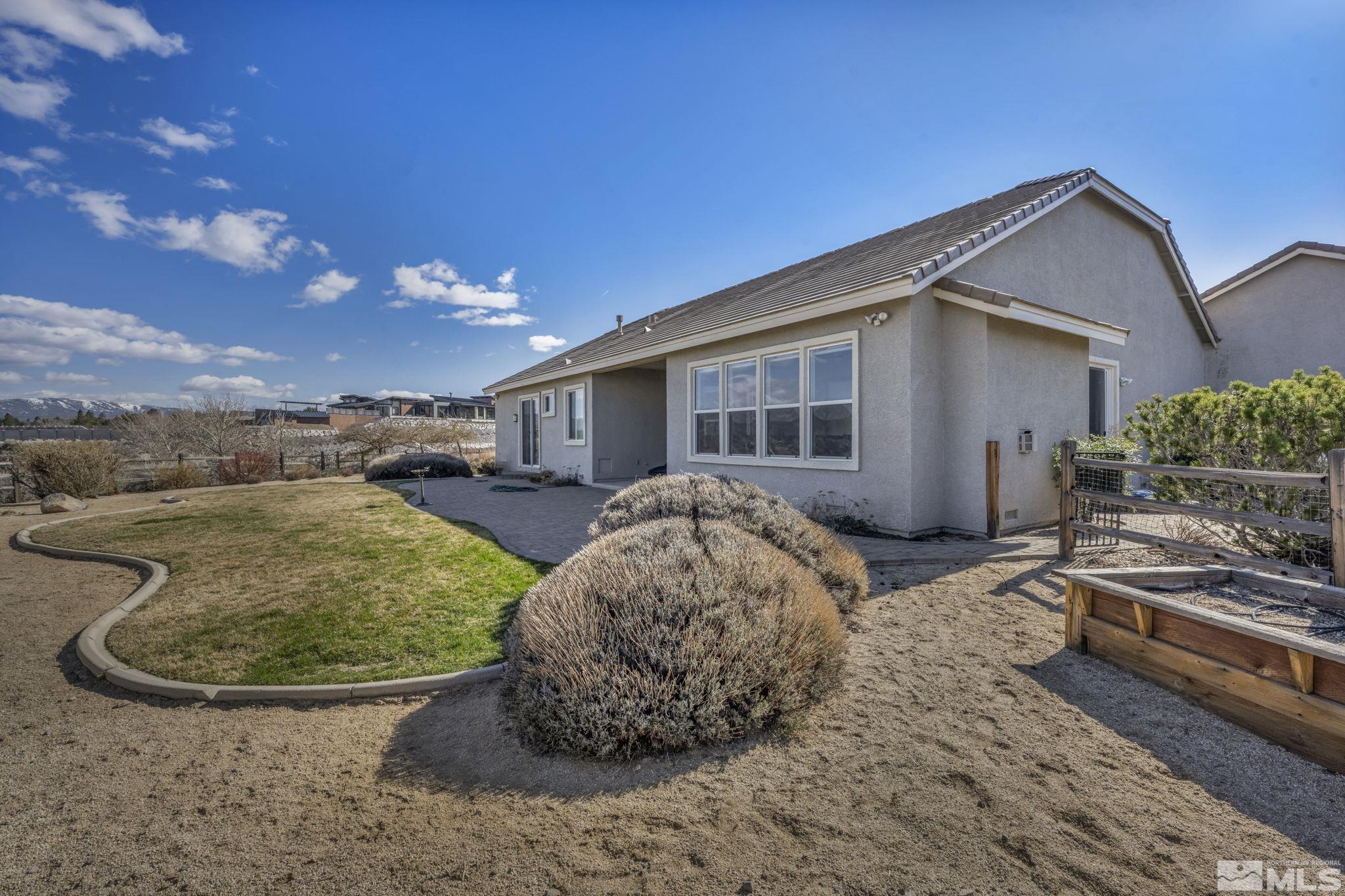 5544 New Mexico Court Reno, NV 89511 - Photo 28 of 39 a view of a house with backyard and sitting area