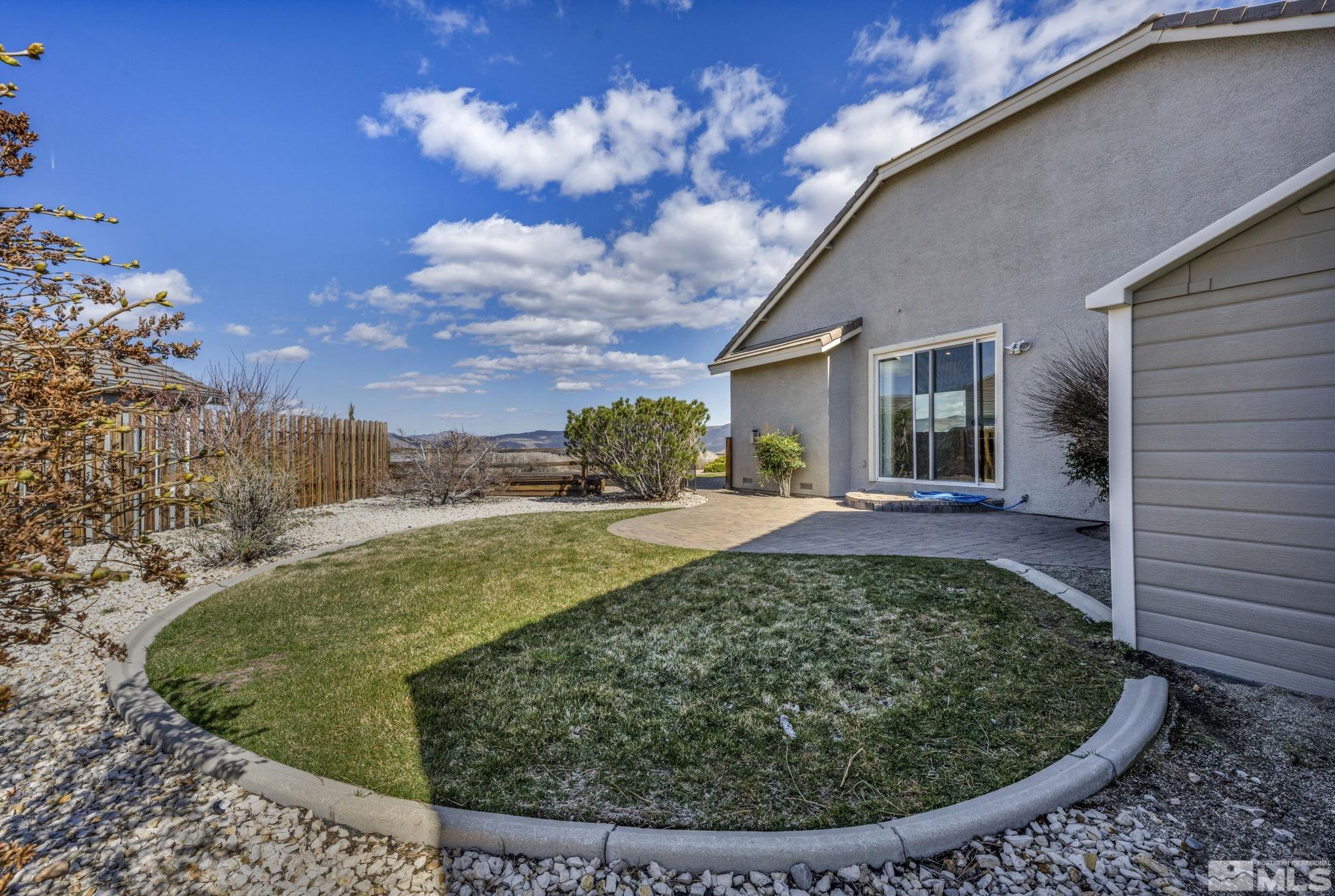 5544 New Mexico Court Reno, NV 89511 - Photo 31 of 39 a view of a backyard with plants
