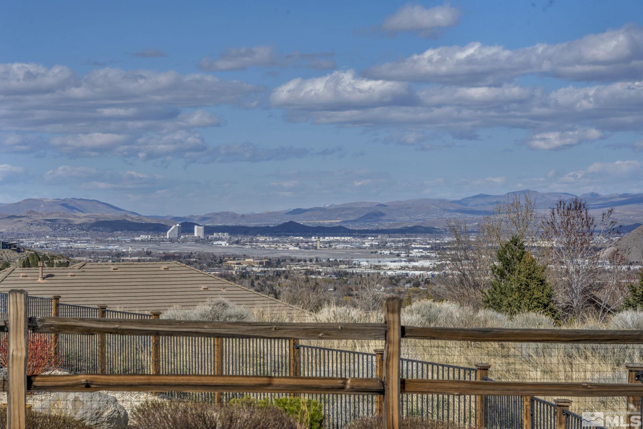 5544 New Mexico Court Reno, NV 89511 - Photo 32 of 39 a view of a lake with big yard