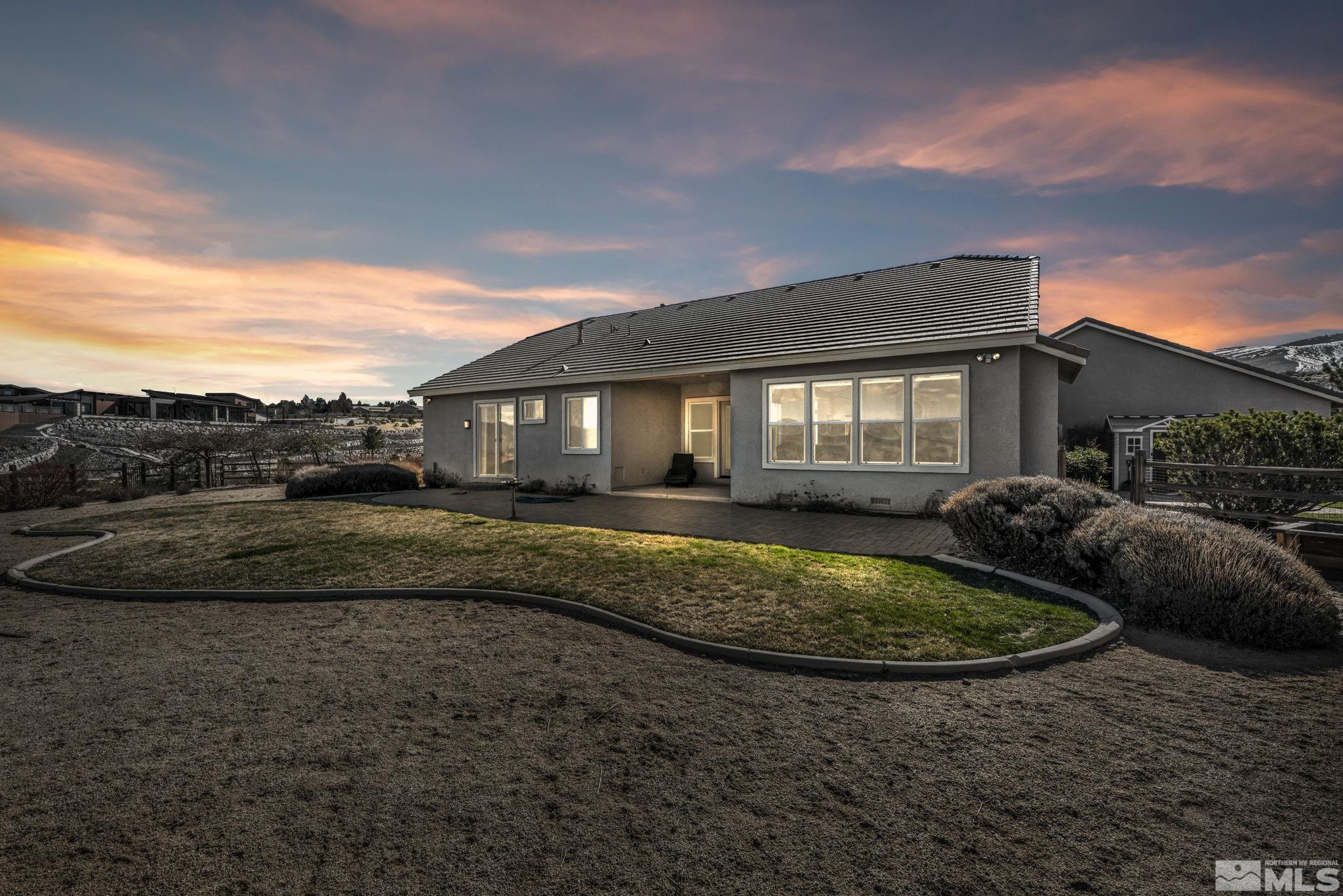 5544 New Mexico Court Reno, NV 89511 - Photo 39 of 39 a view of house with backyard and outdoor seating