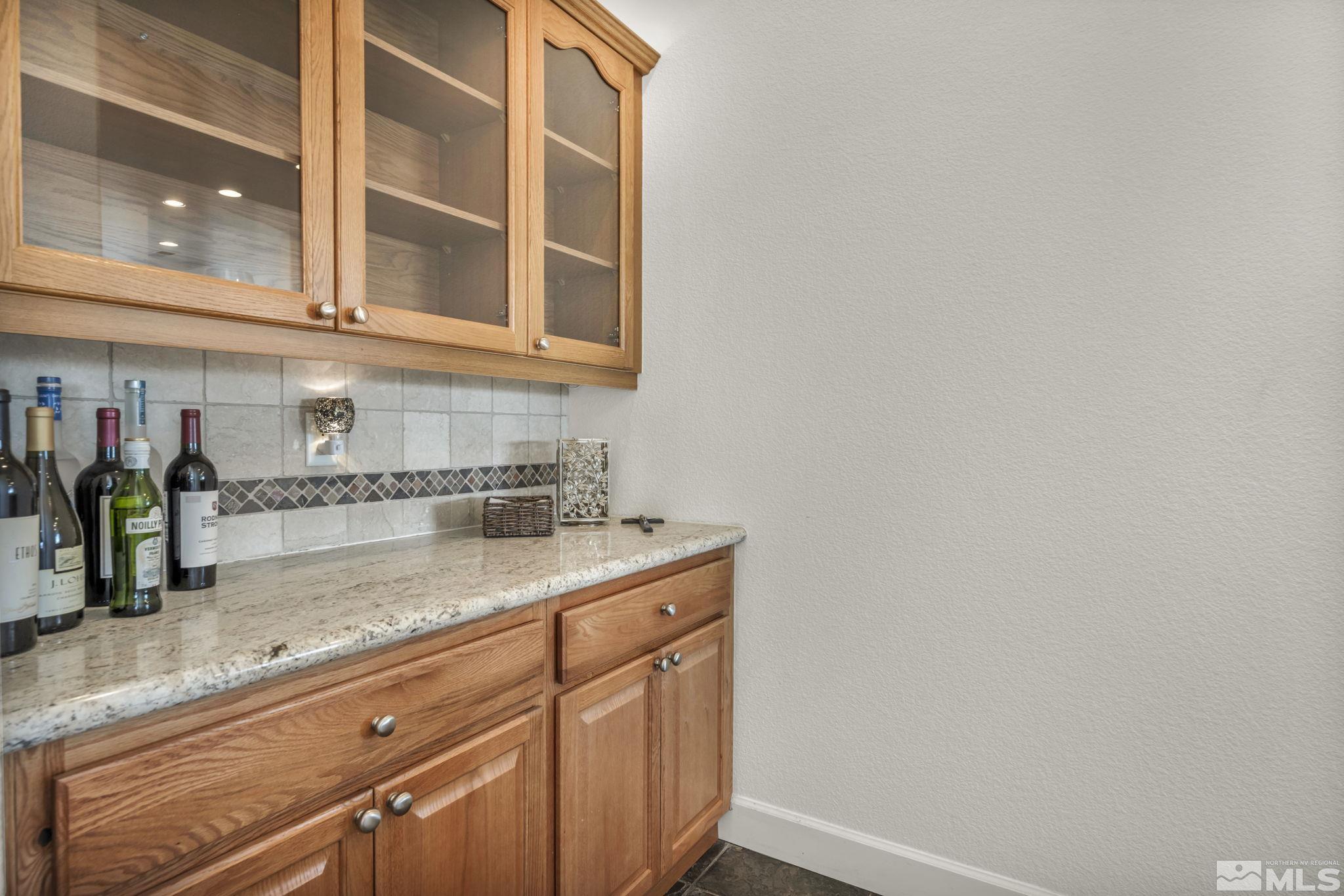 5544 New Mexico Court Reno, NV 89511 - Photo 6 of 39 a kitchen with a sink and cabinets