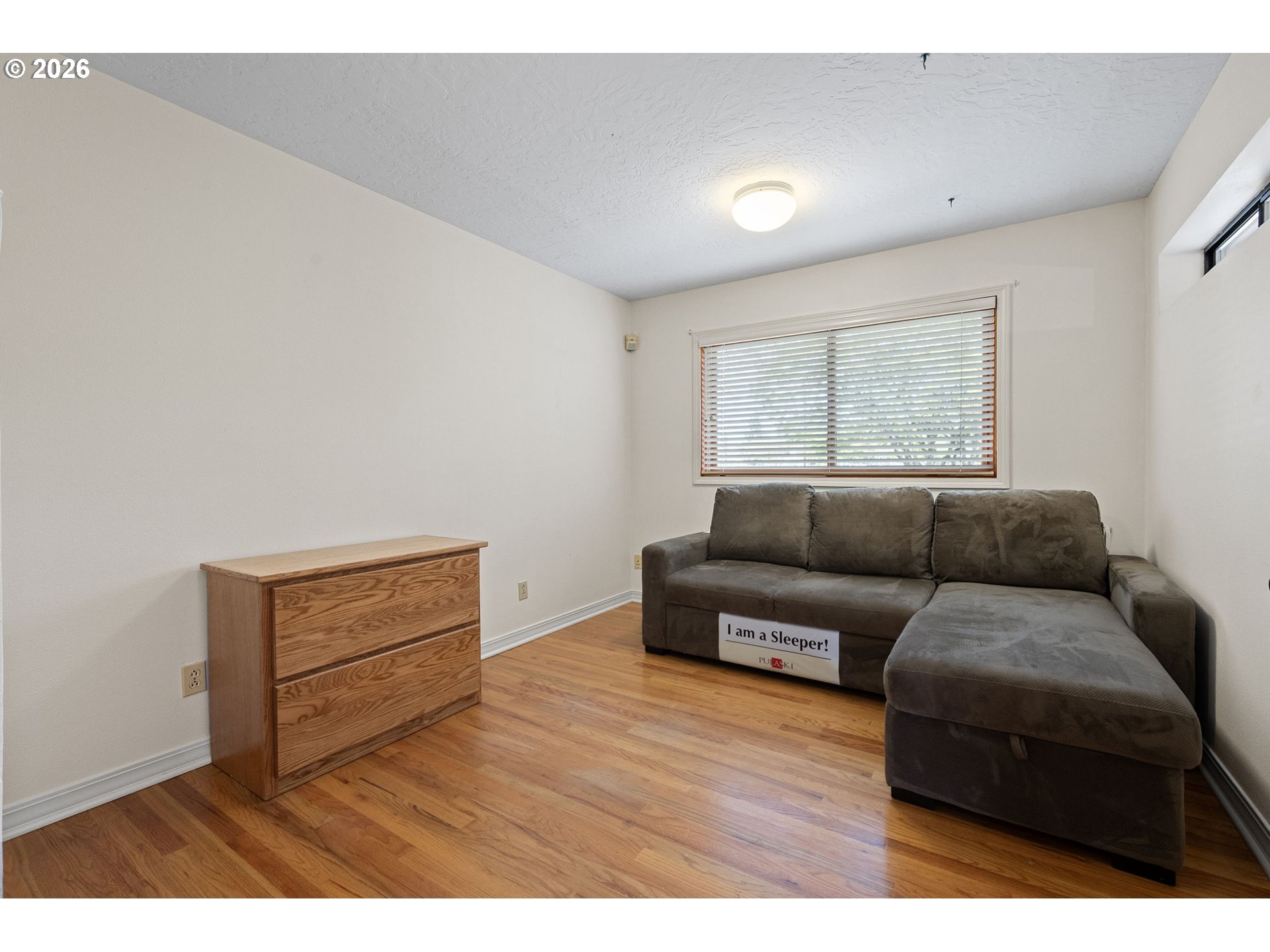 84 Green Lane Eugene, OR 97404 - Photo 26 of 41 a living room with furniture and a window