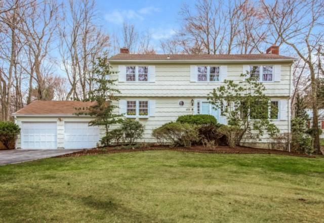 473 Westover Road Stamford, CT 06902 - Photo 1 of 1 a front view of a house with a garden