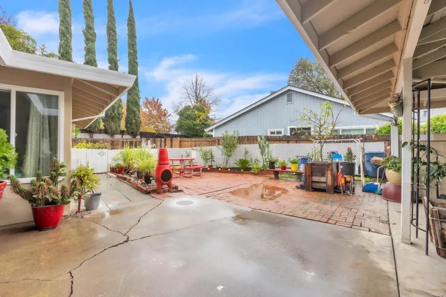 a view of a chairs and tables in the patio