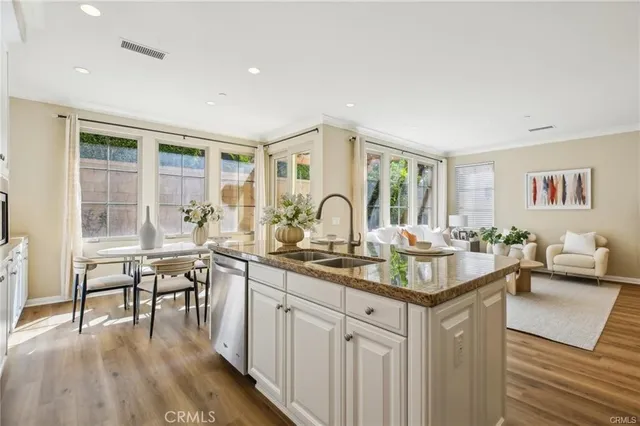 a very nice looking kitchen with a large window