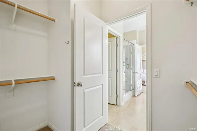 a view of a bathroom from a hallway