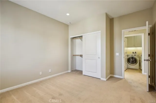 a view of a storage & utility room with closet