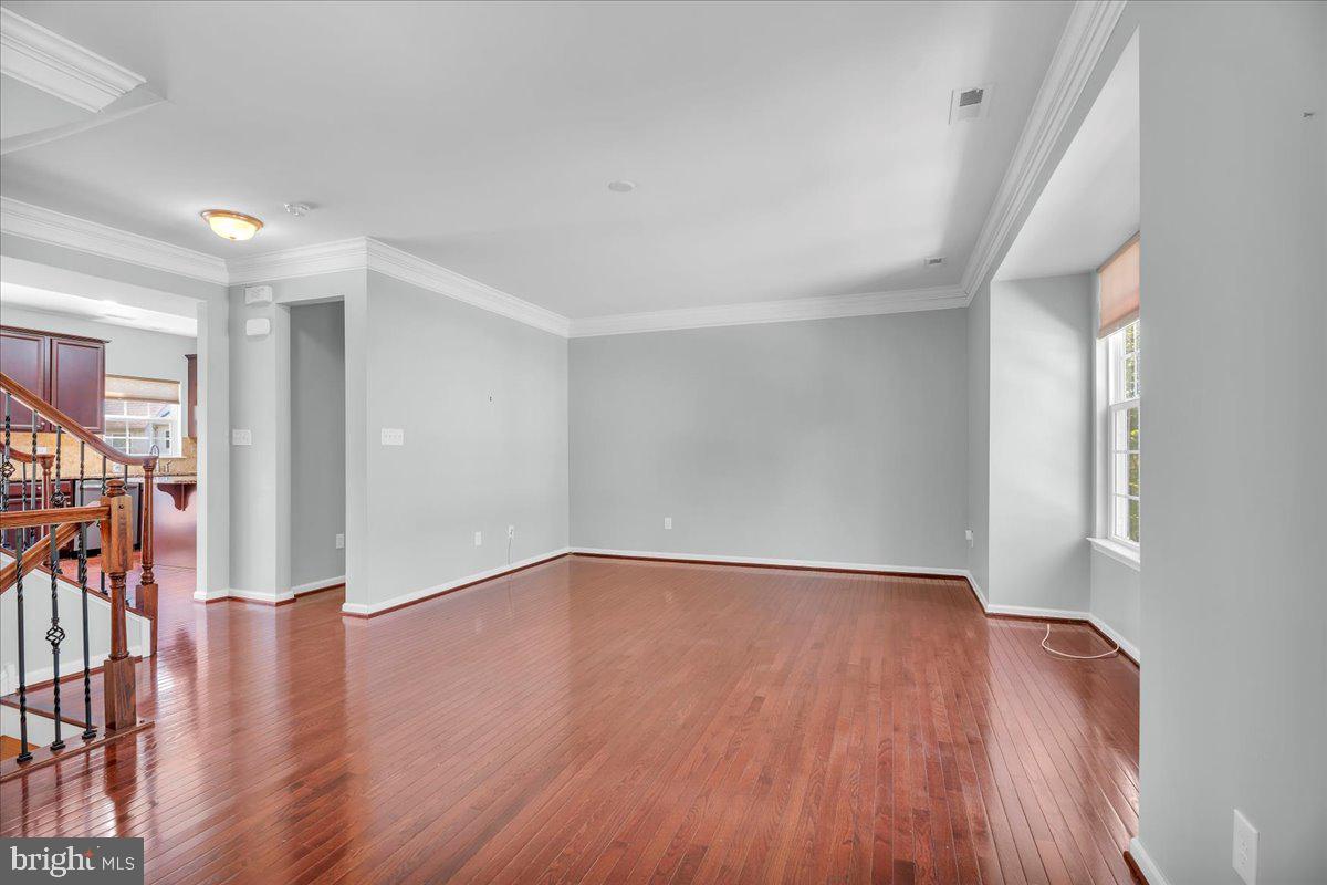 34 Wallace Road Mount Holly, NJ 08060 - Photo 8 of 28 a view of an empty room with wooden floor