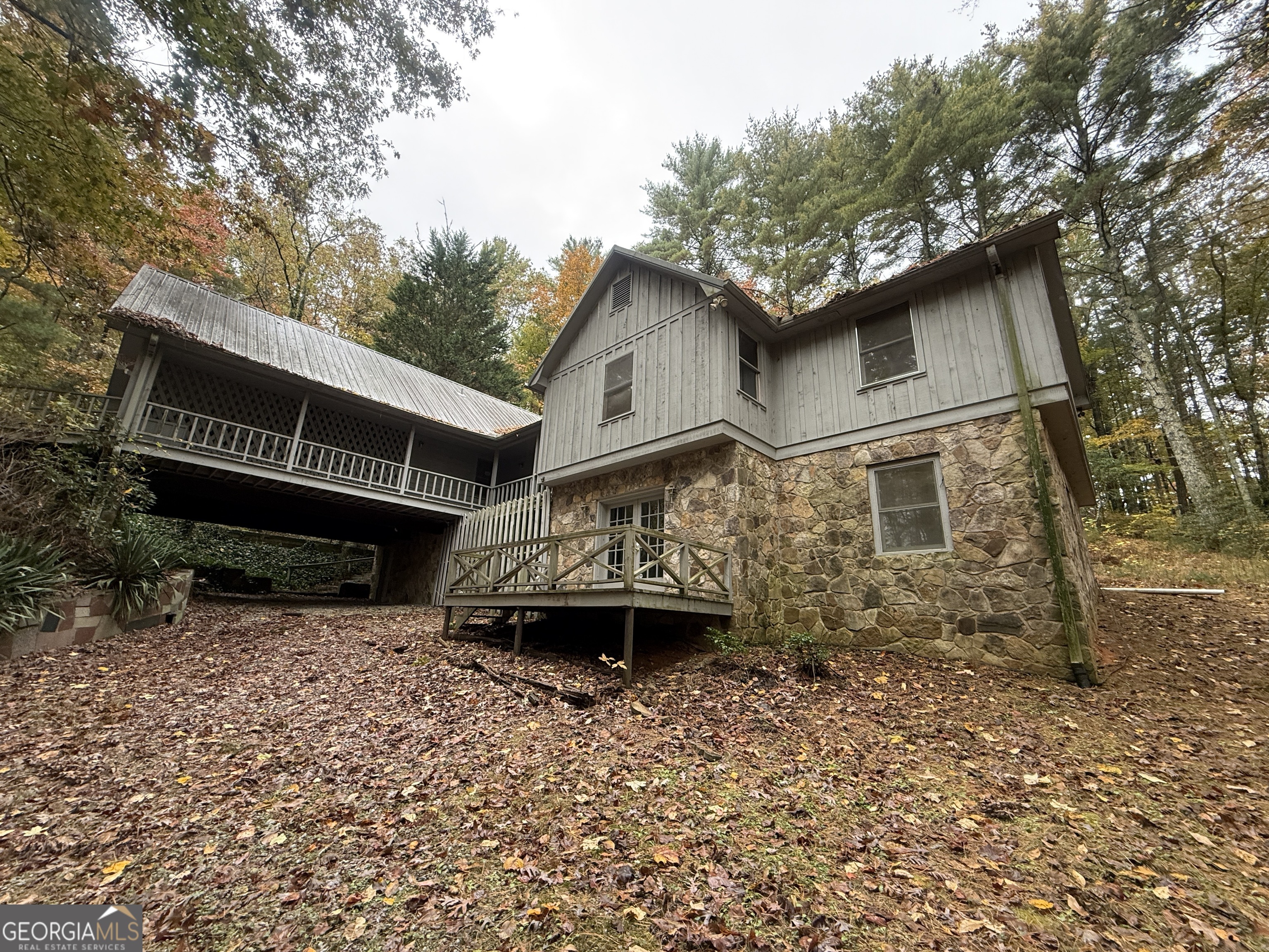 a house with trees in the background