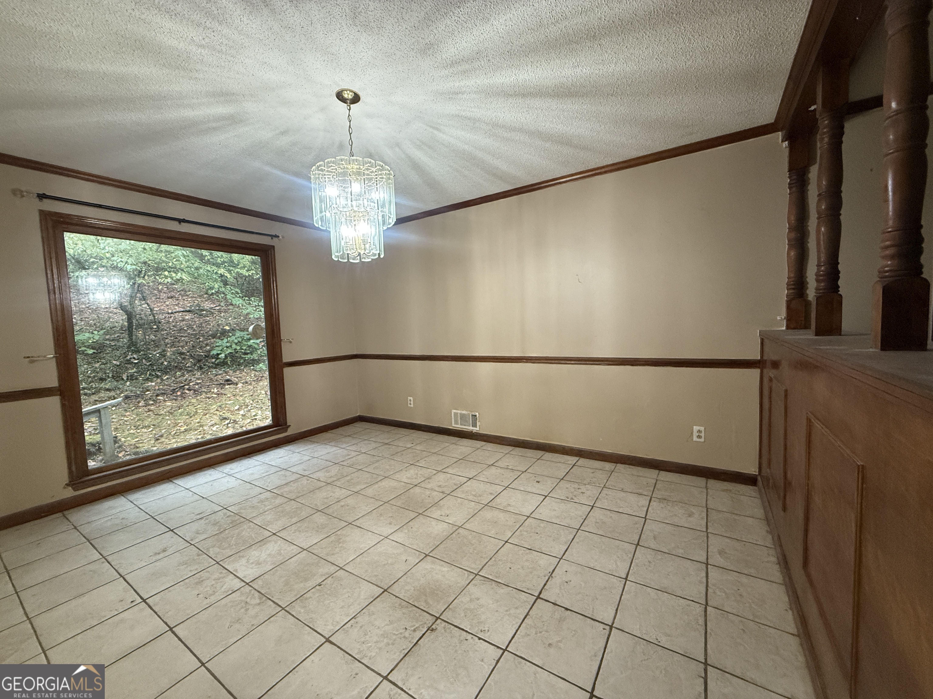 3197 Bridge Creek Road Tiger, GA 30576 - Photo 15 of 30 a view of a livingroom with an empty space and a window