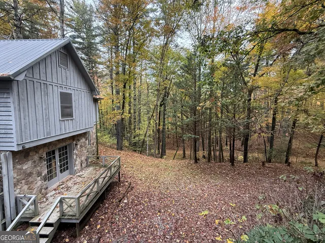 a house view with a backyard space