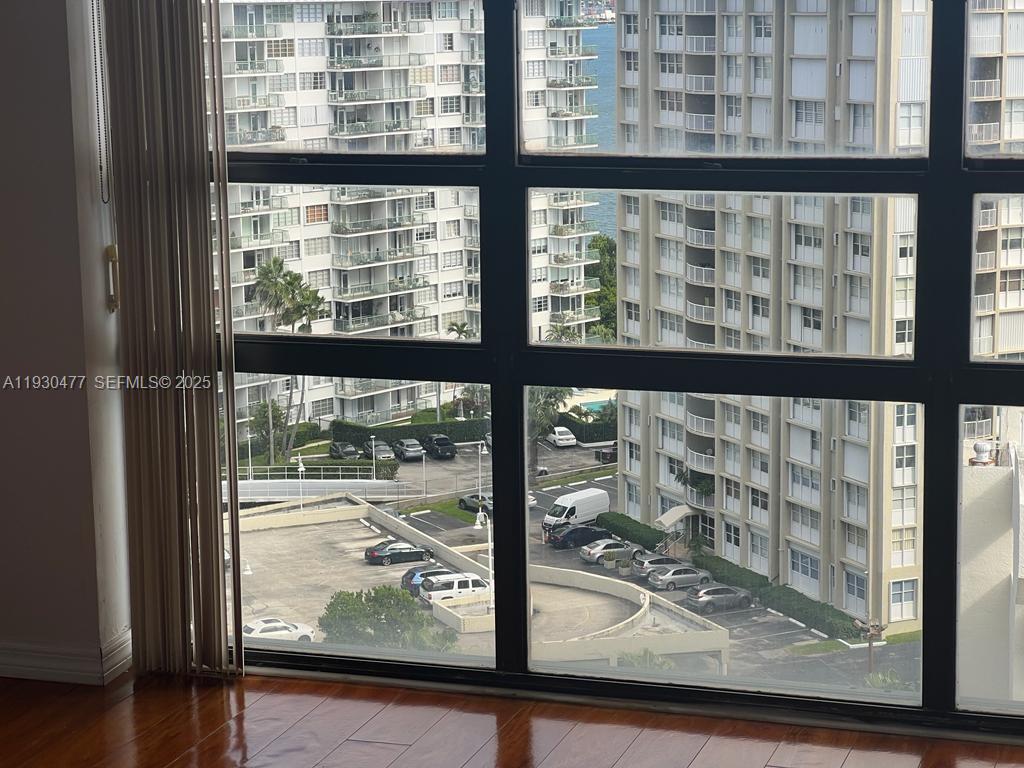 1450 Brickell Bay Drive, Unit 1606 Miami, FL 33131 - Photo 14 of 39 a view of a building from a window