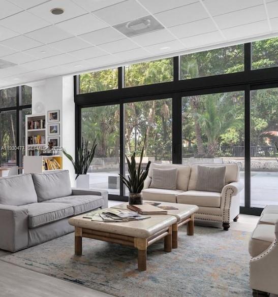 1450 Brickell Bay Drive, Unit 1606 Miami, FL 33131 - Photo 26 of 39 a living room with furniture and a large window