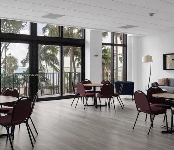 a view of swimming pool with a patio