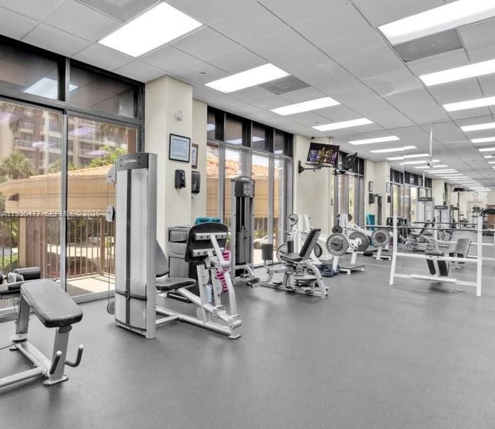 1450 Brickell Bay Drive, Unit 1606 Miami, FL 33131 - Photo 35 of 39 a view of a room with gym equipment