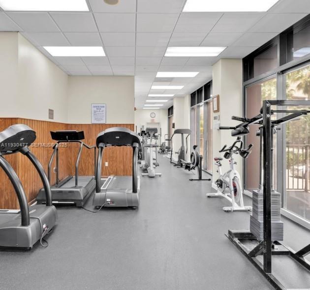 1450 Brickell Bay Drive, Unit 1606 Miami, FL 33131 - Photo 36 of 39 a view of a room with gym equipment