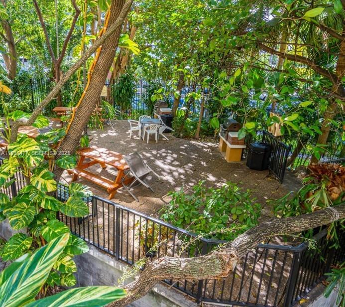 1450 Brickell Bay Drive, Unit 1606 Miami, FL 33131 - Photo 39 of 39 a view of a backyard with sitting area