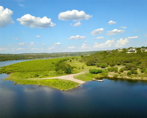 a view of a lake with a house
