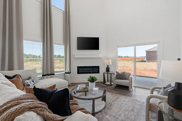a living room with furniture or fireplace and a large window