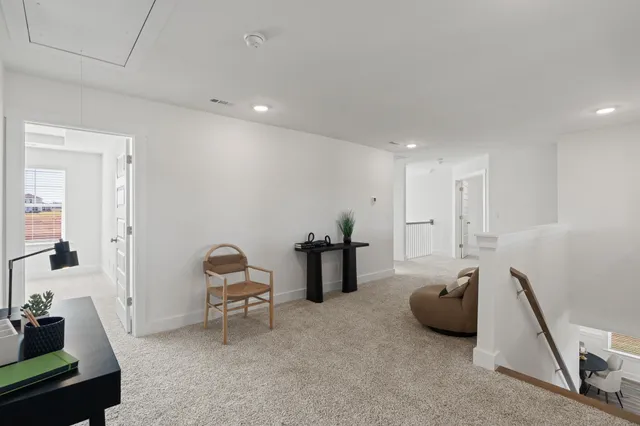 a room with furniture and gym equipment