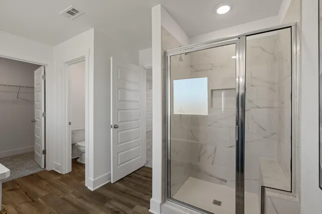 a bathroom with a sink and a shower