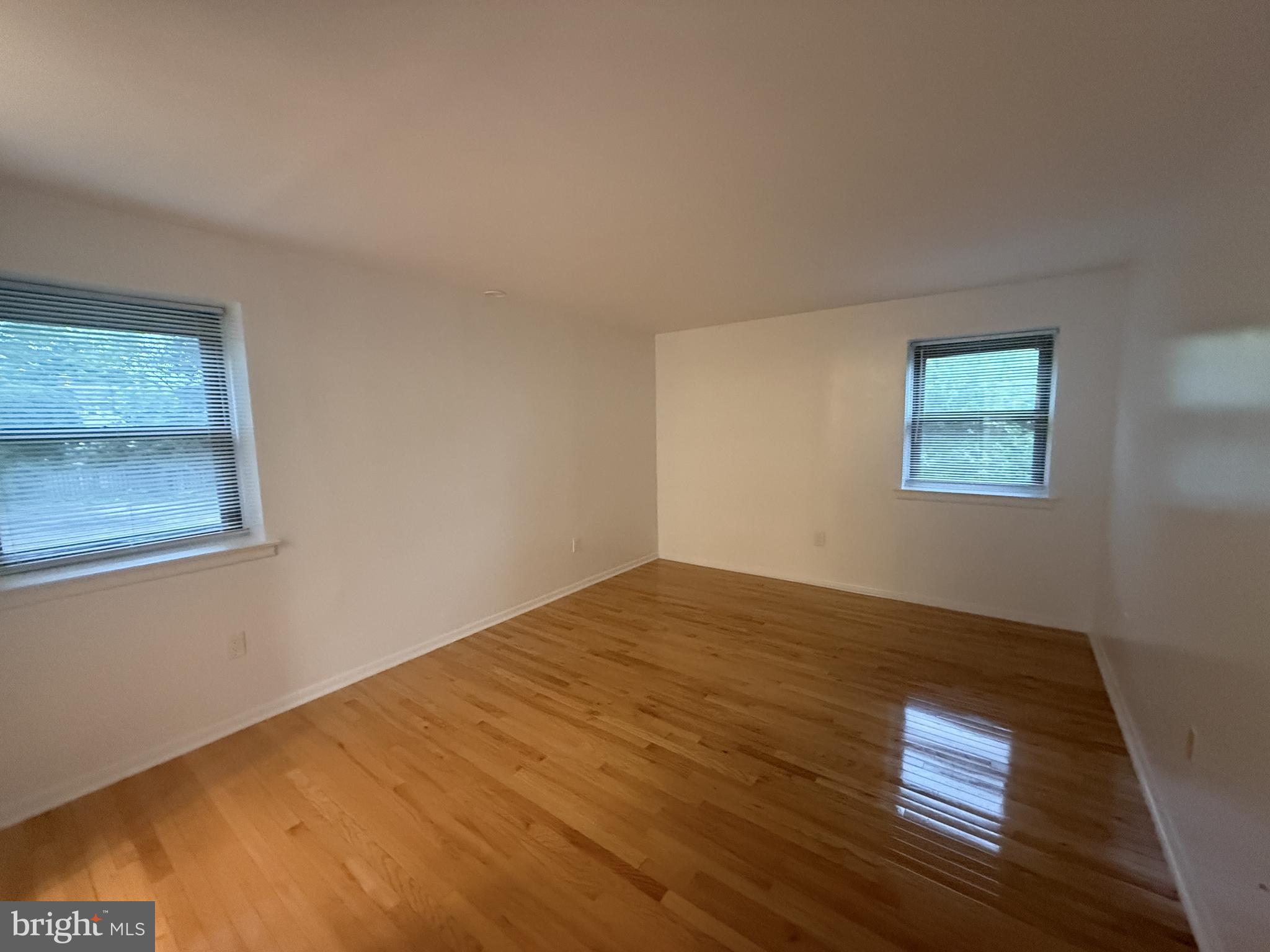 606 Cooper Landing Road, Unit B2K Cherry Hill, NJ 08002 - Photo 15 of 21 a view of a room with wooden floor and window