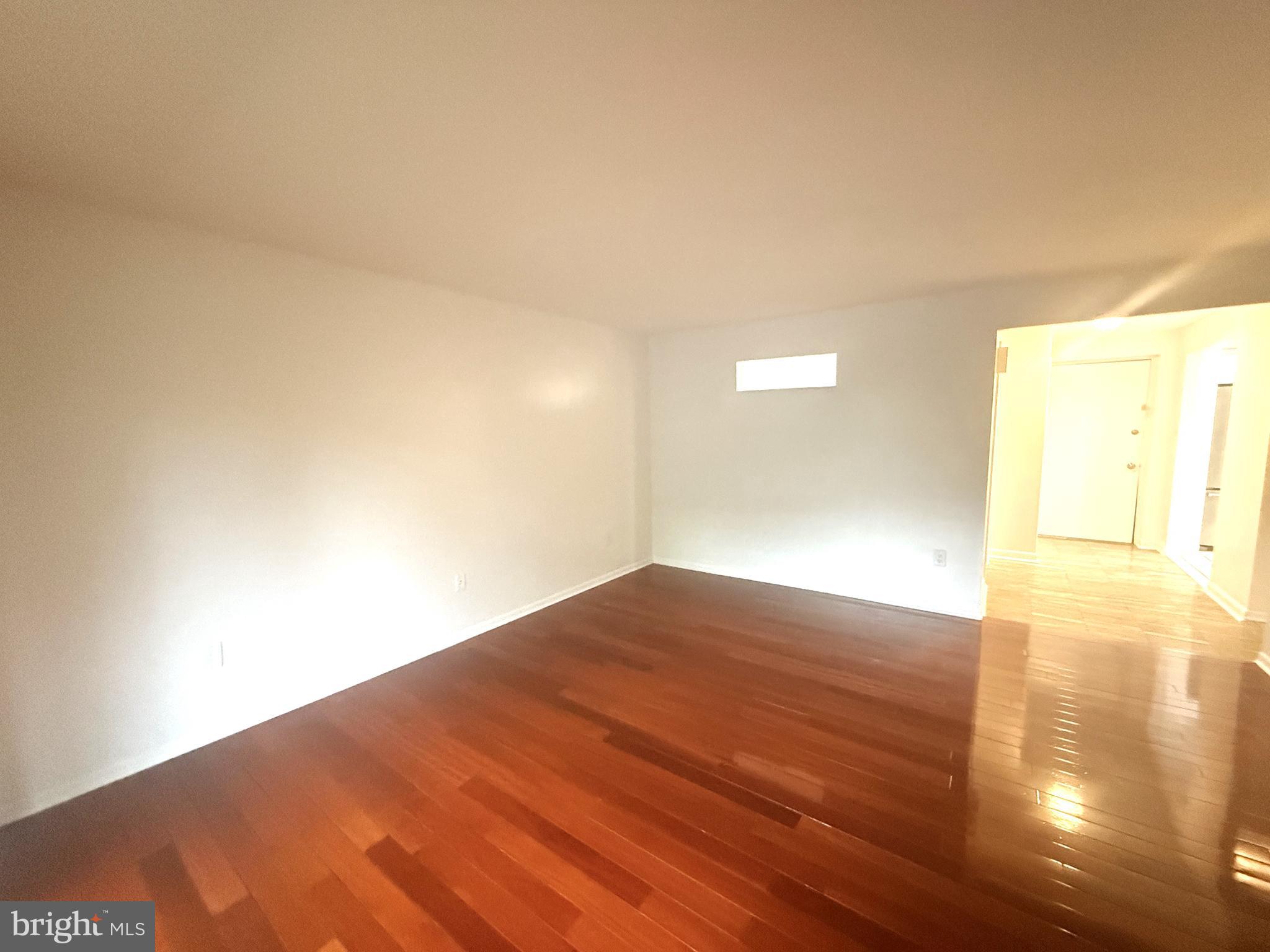 606 Cooper Landing Road, Unit B2K Cherry Hill, NJ 08002 - Photo 10 of 21 a view of empty room with wooden floor