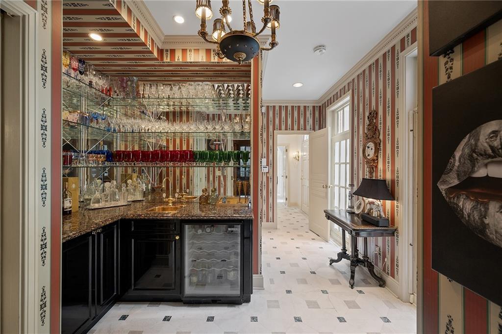 898 Persimmon Road Sewickley, PA 15143 - Photo 18 of 50 There is an elegant bar between the study and the dining room.
