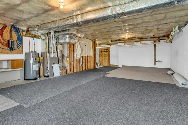 a view of a room with wooden walls