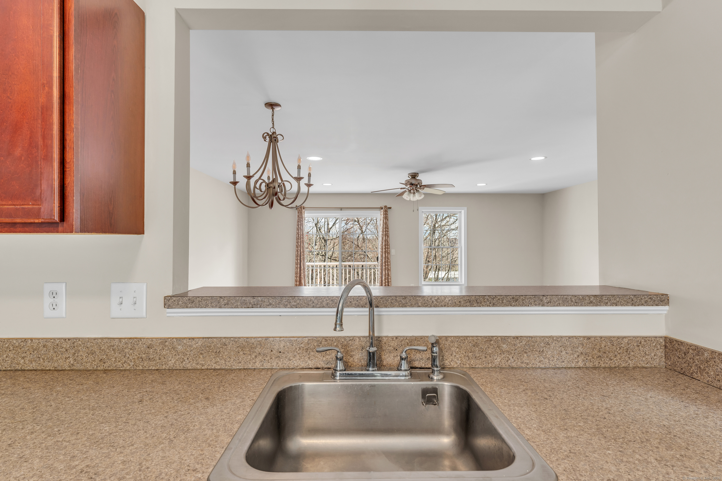 15 Freedom Way, Unit 92 Niantic, CT 06357 - Photo 7 of 33 a bathroom with a sink and a window