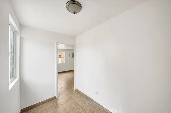 a view of a livingroom with wooden floor