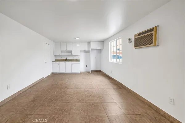 a view of a kitchen with a sink and dishwasher kitchen view