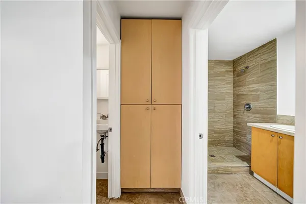 a view of bathroom with a door