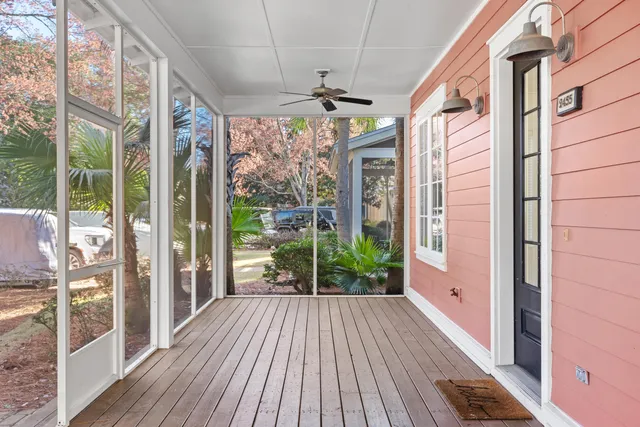 a view of a porch with wooden floor and outdoor space