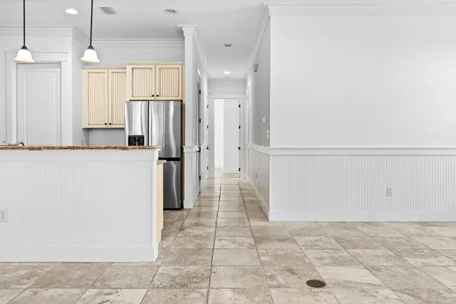 a bathroom with a shower and a sink