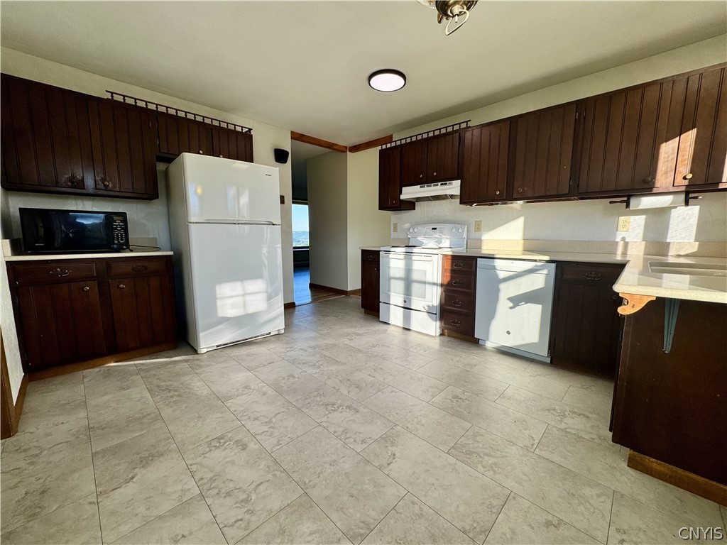 7043 Hutches Road Bath, NY 14810 - Photo 7 of 32 Kitchen with new Luxury Vinyl flooring