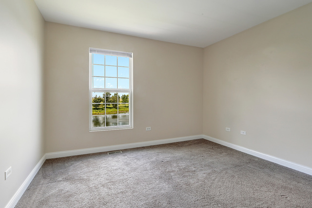 15324 Pinewood Road Lockport, IL 60441 - Photo 14 of 18 an empty room with a window