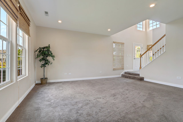 15324 Pinewood Road Lockport, IL 60441 - Photo 4 of 18 a view of an empty room with potted plants