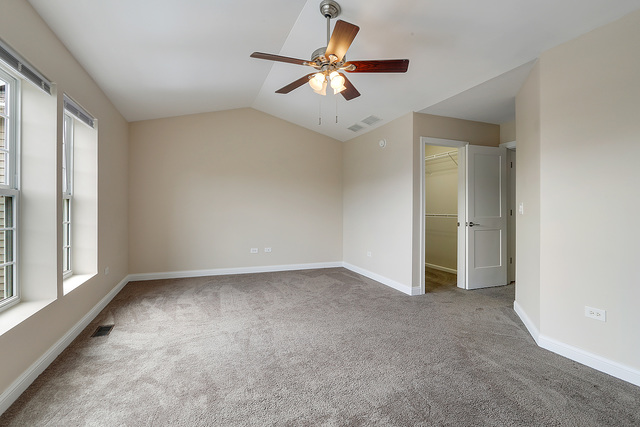 15324 Pinewood Road Lockport, IL 60441 - Photo 9 of 18 a view of an empty room with a window