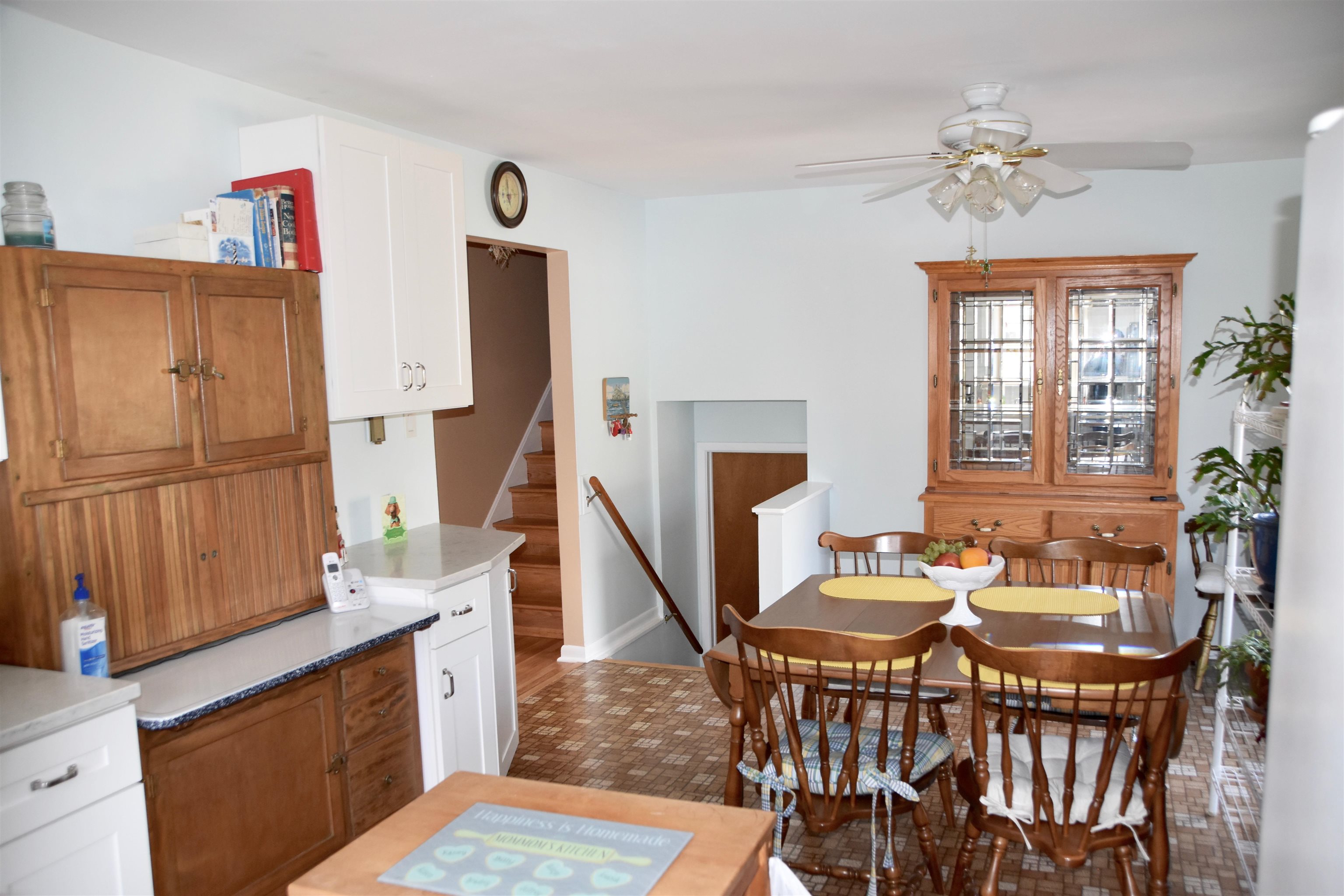 91 Tyler Road Ocean View, NJ 08230 - Photo 11 of 34 a dining room with furniture a chandelier and wooden floor