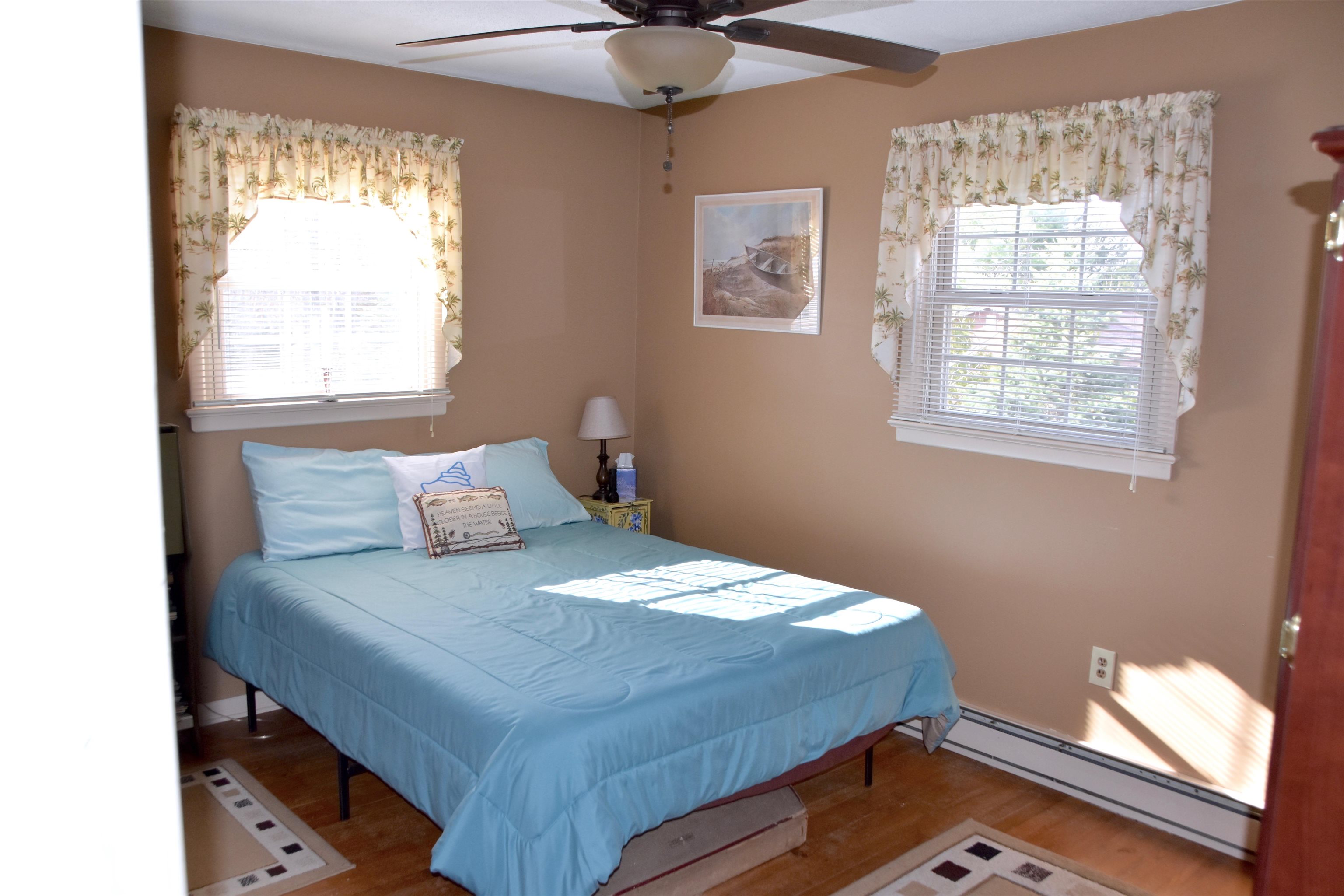 91 Tyler Road Ocean View, NJ 08230 - Photo 18 of 34 a bedroom with a bed and window