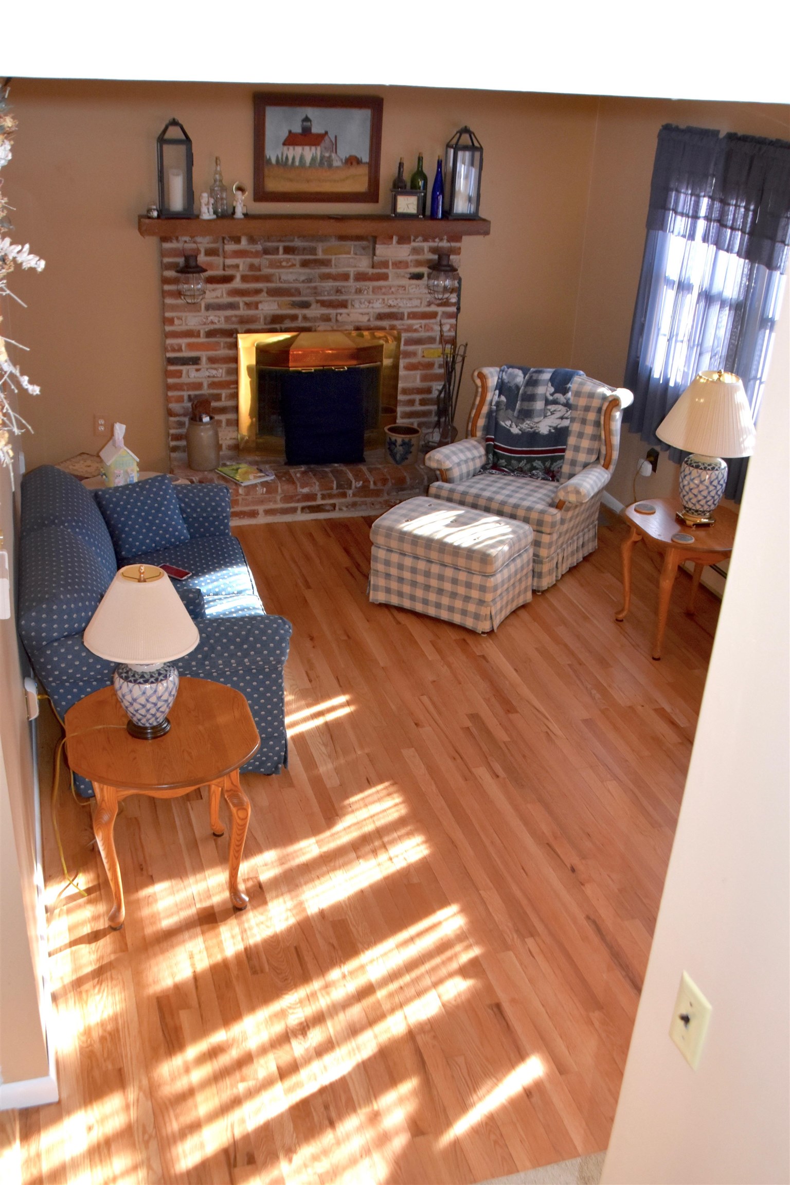 91 Tyler Road Ocean View, NJ 08230 - Photo 21 of 34 a living room with furniture and a fireplace