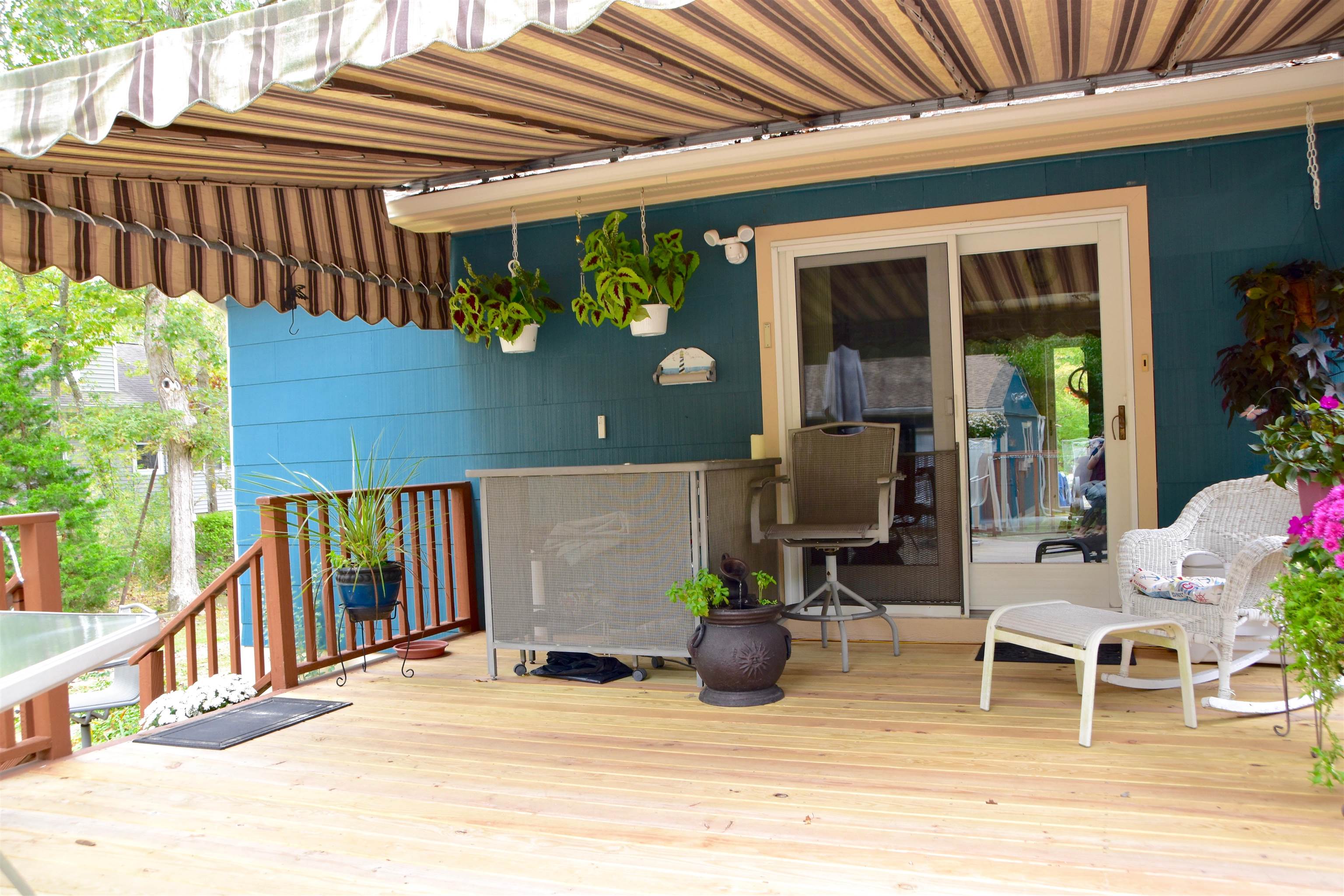 91 Tyler Road Ocean View, NJ 08230 - Photo 24 of 34 a view of a patio with table and chairs and potted plants