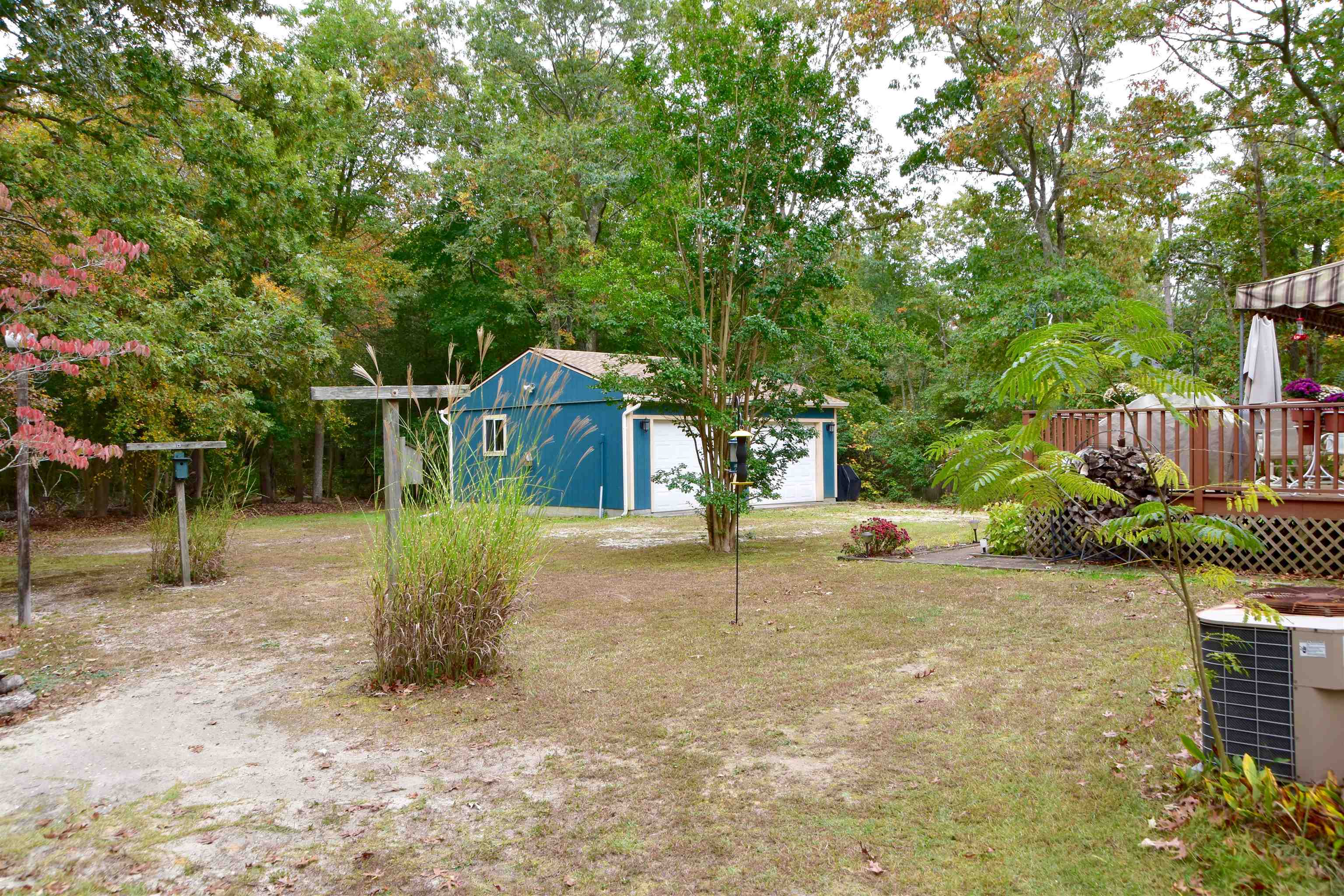 91 Tyler Road Ocean View, NJ 08230 - Photo 32 of 34 a view of a house with a yard