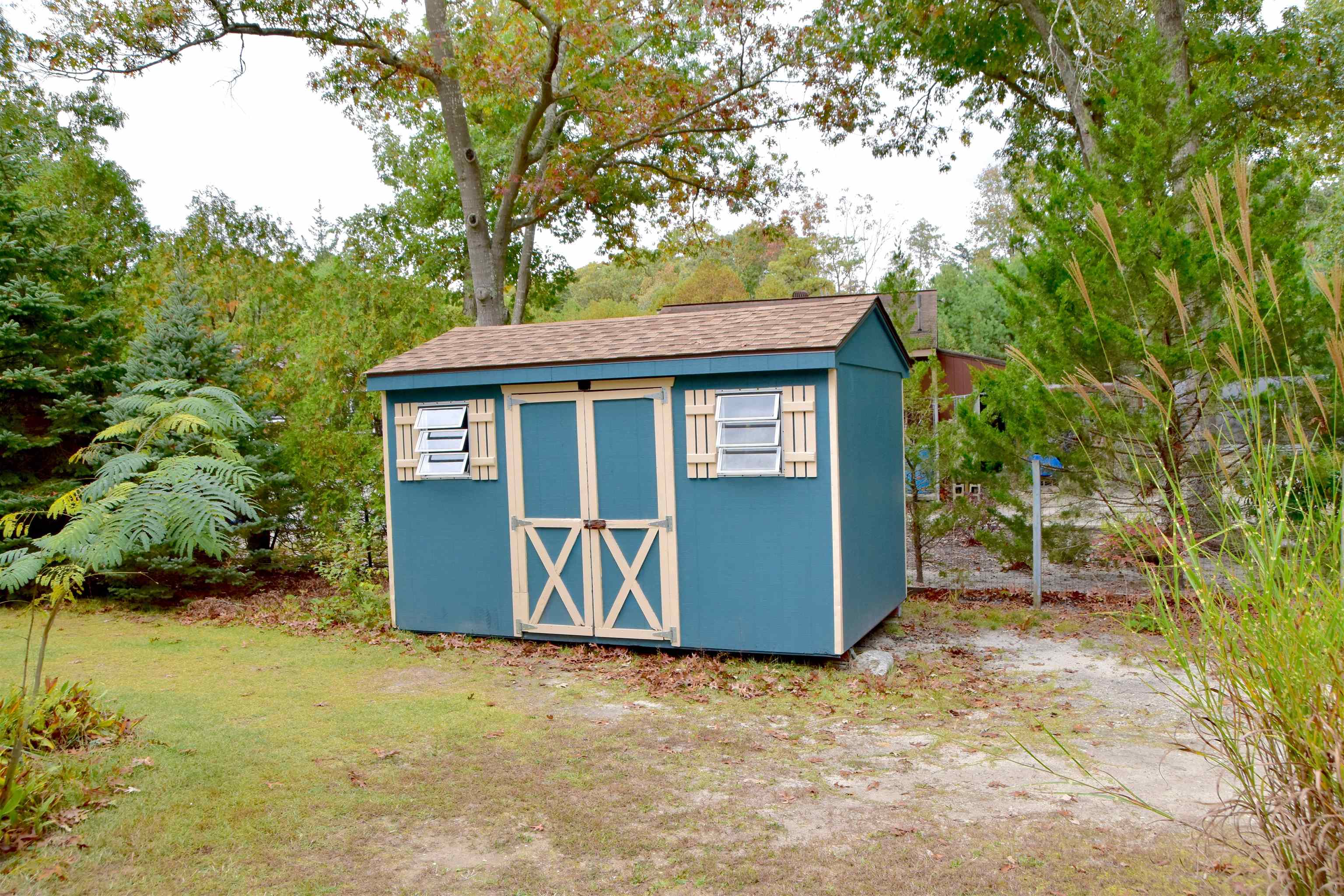 91 Tyler Road Ocean View, NJ 08230 - Photo 34 of 34 a front view of a house with a garden
