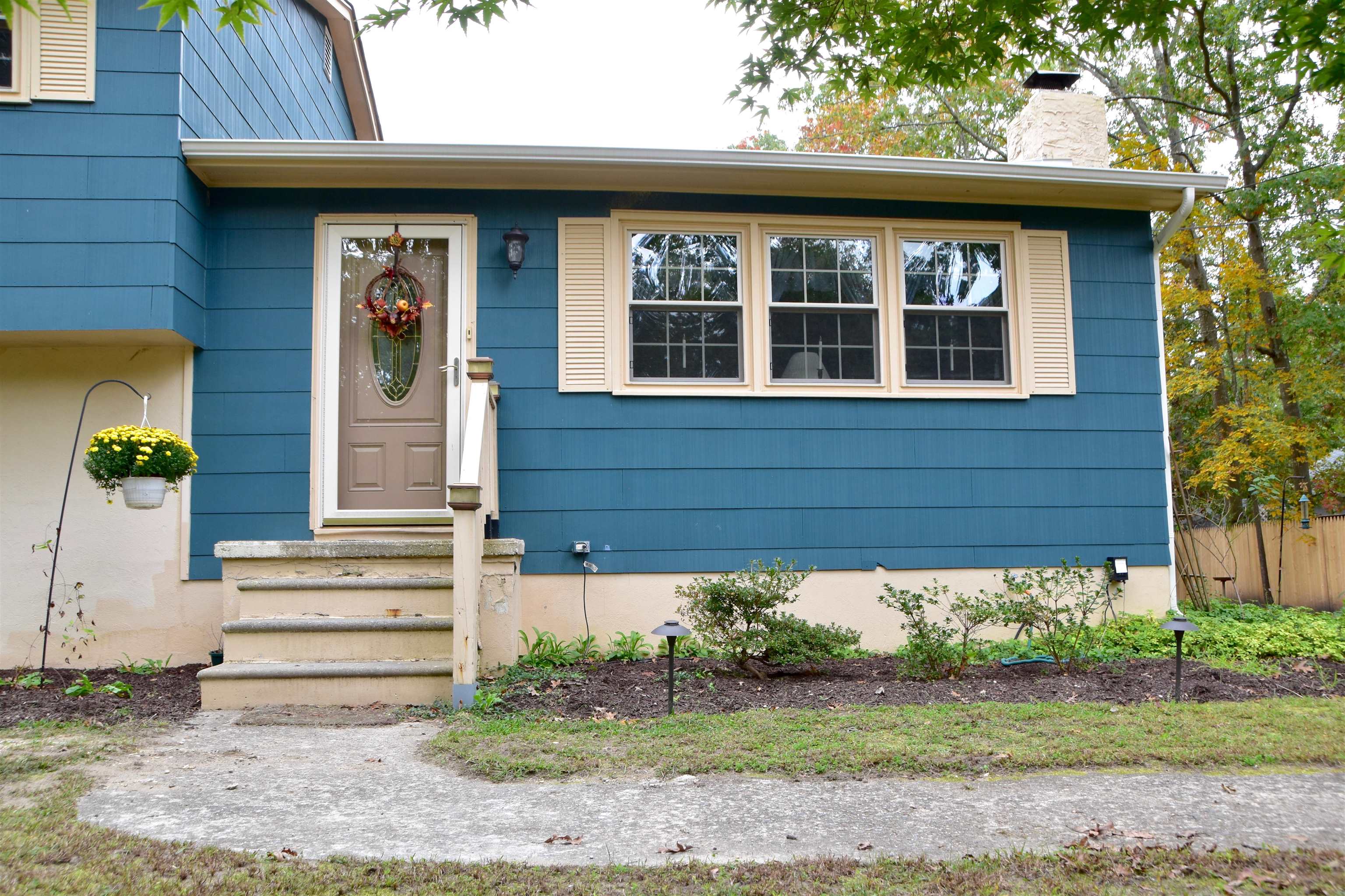 91 Tyler Road Ocean View, NJ 08230 - Photo 4 of 34 a front view of a house with a yard