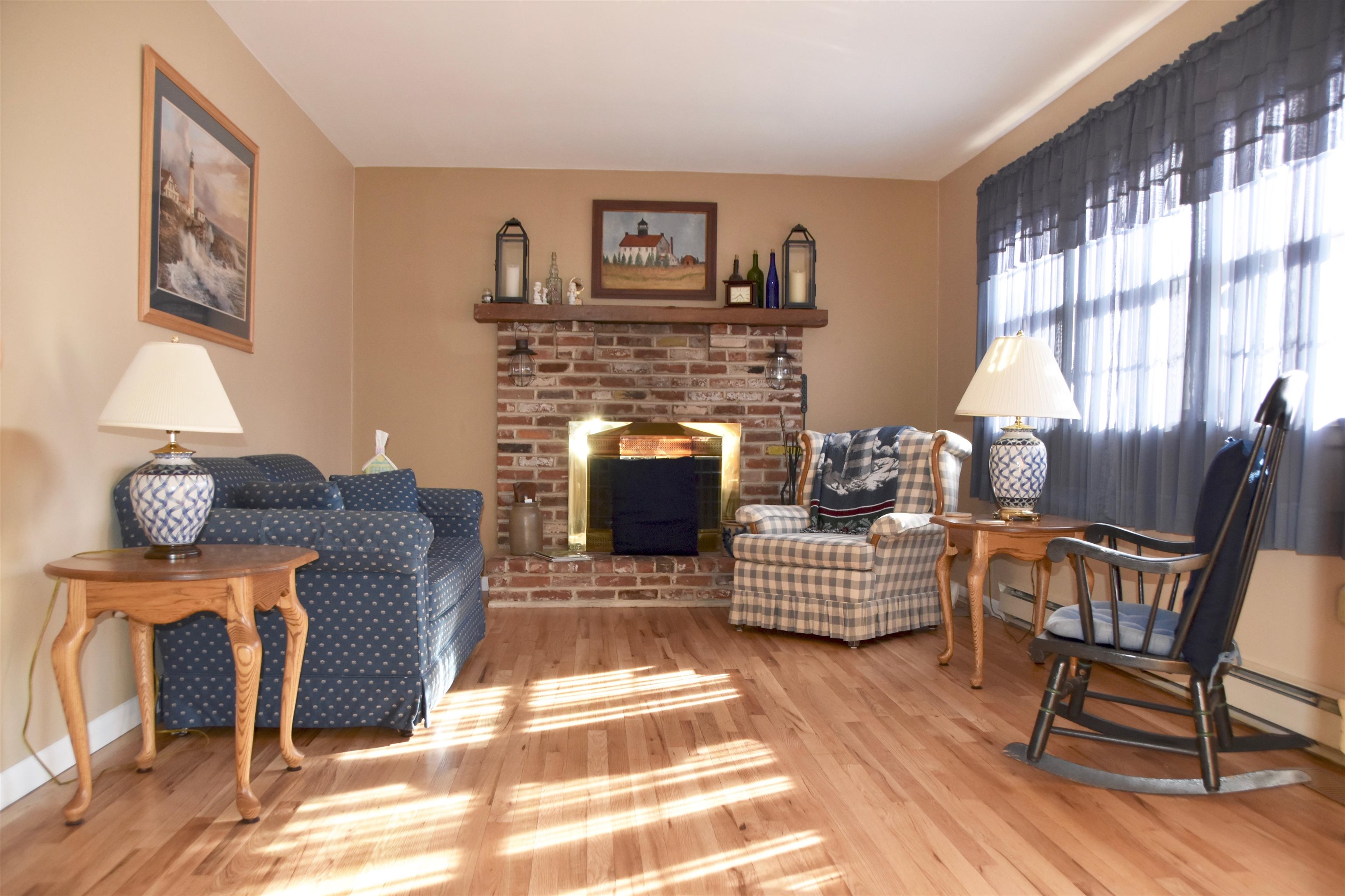 91 Tyler Road Ocean View, NJ 08230 - Photo 8 of 34 a living room with furniture and a fireplace