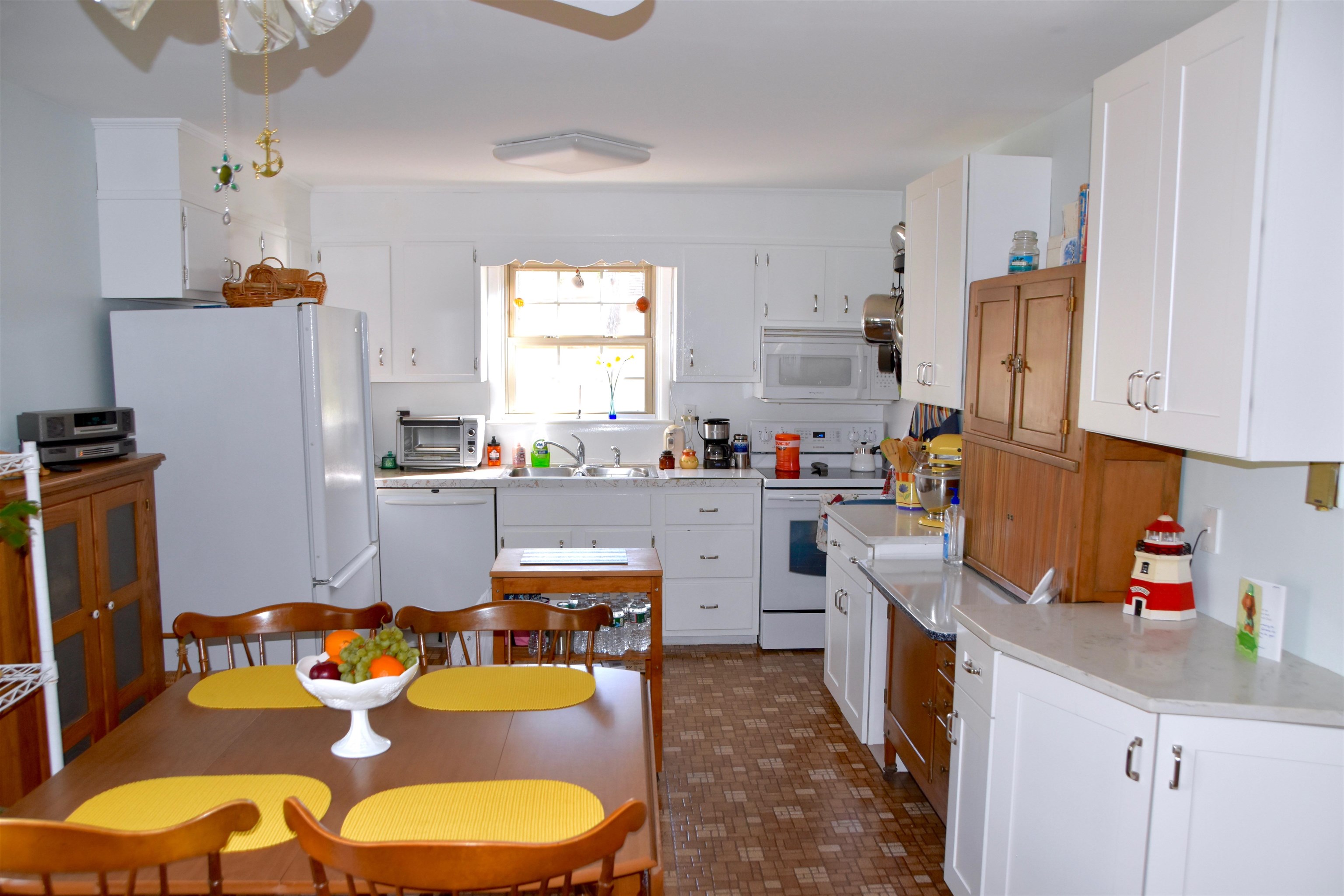 91 Tyler Road Ocean View, NJ 08230 - Photo 9 of 34 a kitchen with stainless steel appliances a refrigerator and a sink