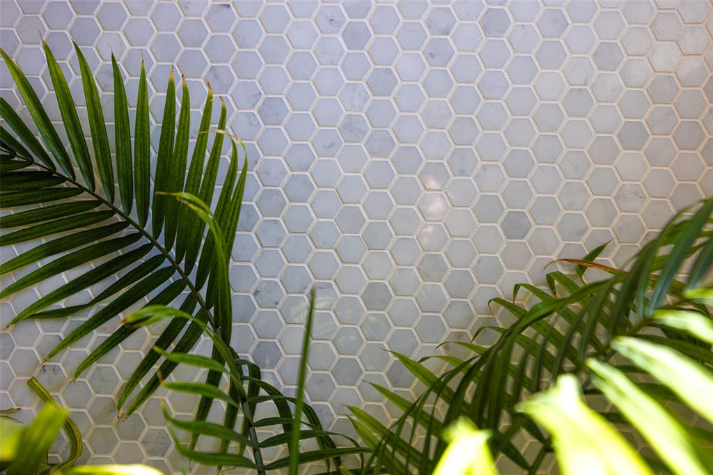 3922 Gilbert Avenue, Unit 214 Dallas, TX 75219 - Photo 21 of 27 Light-toned hexagonal tilework